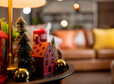 christmas and new year festive background,red color home model decorative items on side table in living room apartment residential with light bokeh happiness joyful event